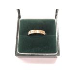 A LADIES 9CT YELLOW GOLD DIAMOND ETERNITY RING, WEIGHT 2.3G
