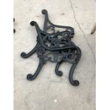 A PAIR OF BLACK PAINTED CAST IRON BENCH ENDS WITH LION HEADS
