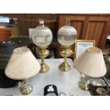 A PAIR OF VINTAGE BRASS OIL LAMPS AND A PAIR OF TABLE LAMPS (4)