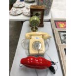 A VINTAGE TELEPHONE, 'RED LIPS' PHONE AND TWO CLOCKS (4)