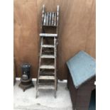 TWO VINTAGE WOODEN STEP LADDERS ONE FIVE RUNG AND ONE SIX RUNG