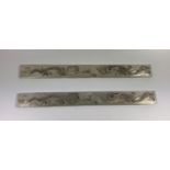 A PAIR OF CHINESE WHITE METAL DRAGON DESIGN BOOKMARKS, LENGTH 23CM