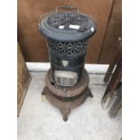 AN ORNATE METAL VALOR PARAFFIN HEATER 60CM HIGH