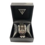 A GENTS BOXED 'GUESS' STAINLESS STEEL TANK STYLE WATCH