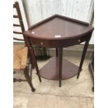 A MAHOGANY CORNER TABLE WITH TWO DRAWERS AND LOWER SHELF