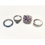 FOUR ASSORTED LADIES SILVER RINGS