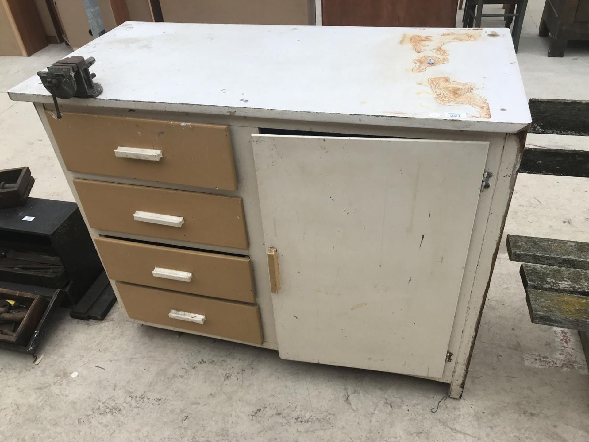 A RETRO KITCHEN CABINET WITH FOUR DRAWERS AND ONE DOOR AND A WH COLT ENGINEERS WILSON VICE LONDON