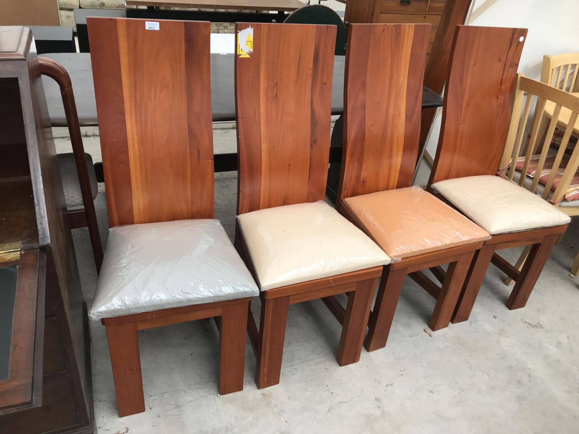 FOUR HIGH BACKED HARDWOOD DINING CHAIRS