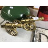 A PAIR OF VINTAGE BRASS MODEL DESK CANNONS