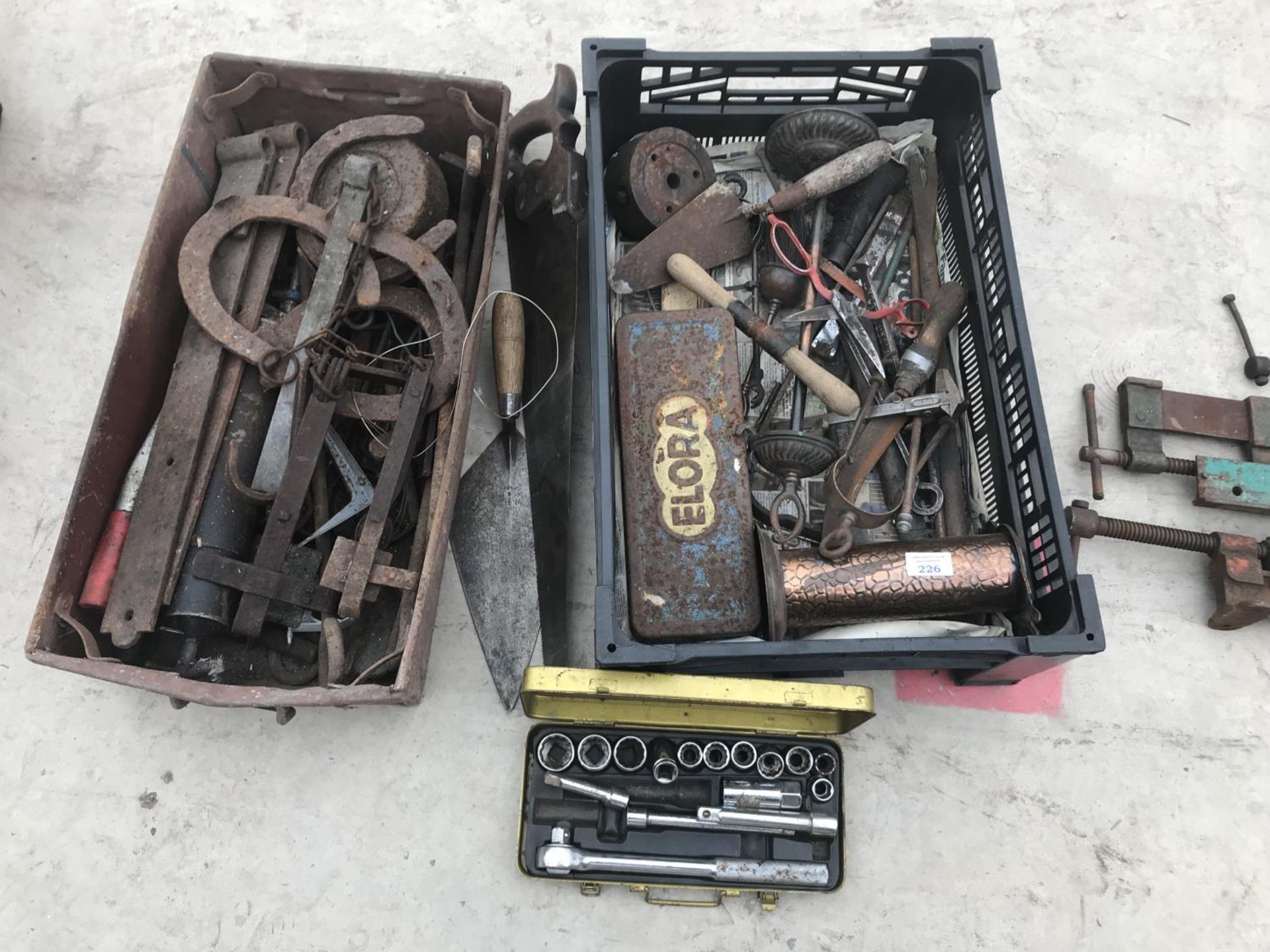 TWO BOXES OF VINTAGE ITEMS TO INCLUDE TOOLS, HORSESHOES, GATE BANDS, TRAPS ETC