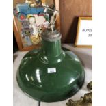 A VINTAGE GREEN ENAMEL CEILING LIGHT SHADE