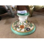 A CHARLOTTE RHEAD CERAMIC CANDLESTICK HOLDER