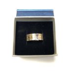 A GENTS BOXED 'TITANIUM' BAND RING