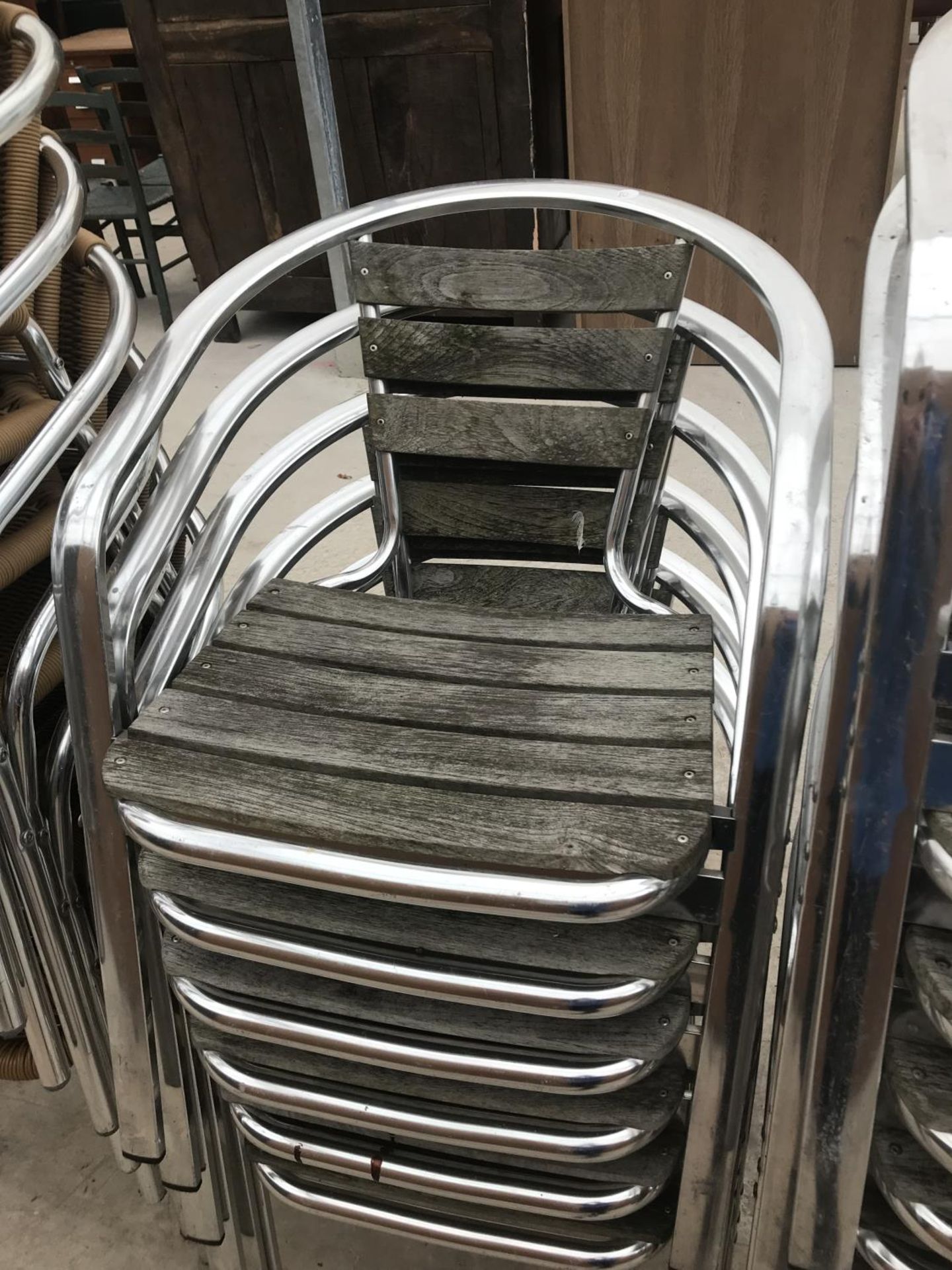 TWENTY TWO CHROME BISTRO CHAIRS SOME WITH WOOD AND SOME WITH WOVEN PLASTIC SEATS - Image 3 of 4