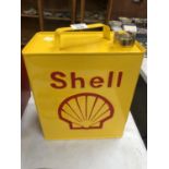 A YELLOW METAL 'SHELL' PETROL CAN