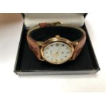 A GENTS BOXED 'ACCURIST' WATCH, WORKING