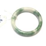 A COLLECTABLE 'JADE STYLE' BANGLE