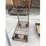 A VINTAGE METAL FOUR WHEELED TROLLEY