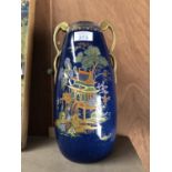 A CARLTON WARE MIKADO ORIENTAL PATTERN TWIN HANDLED VASE, (HANDLE A/F)