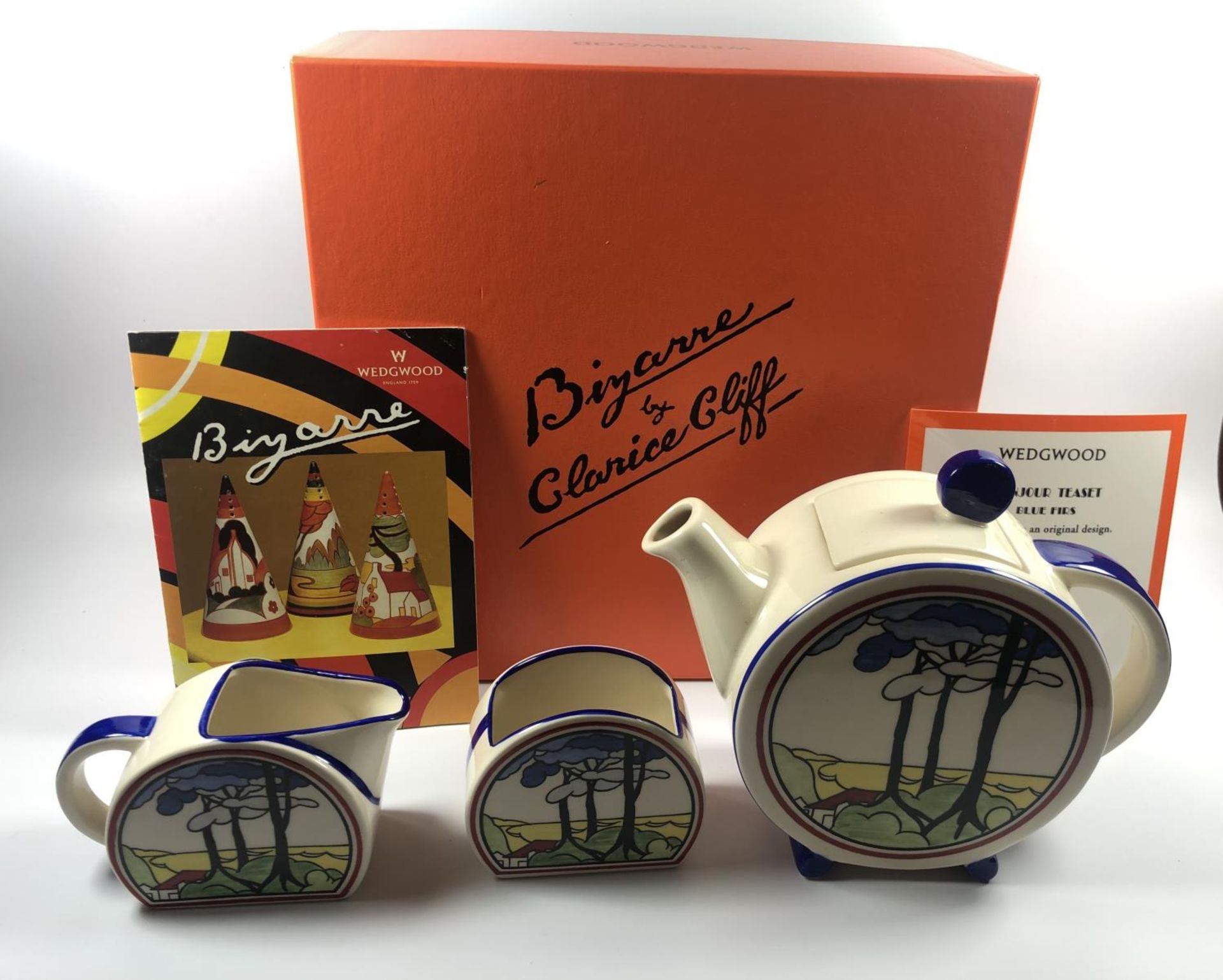 A BOXED WEDGWOOD 'CLARICE CLIFF' COLLECTION BLUE FIRS TEA FOR ONE SET, WITH CERTIFICATE