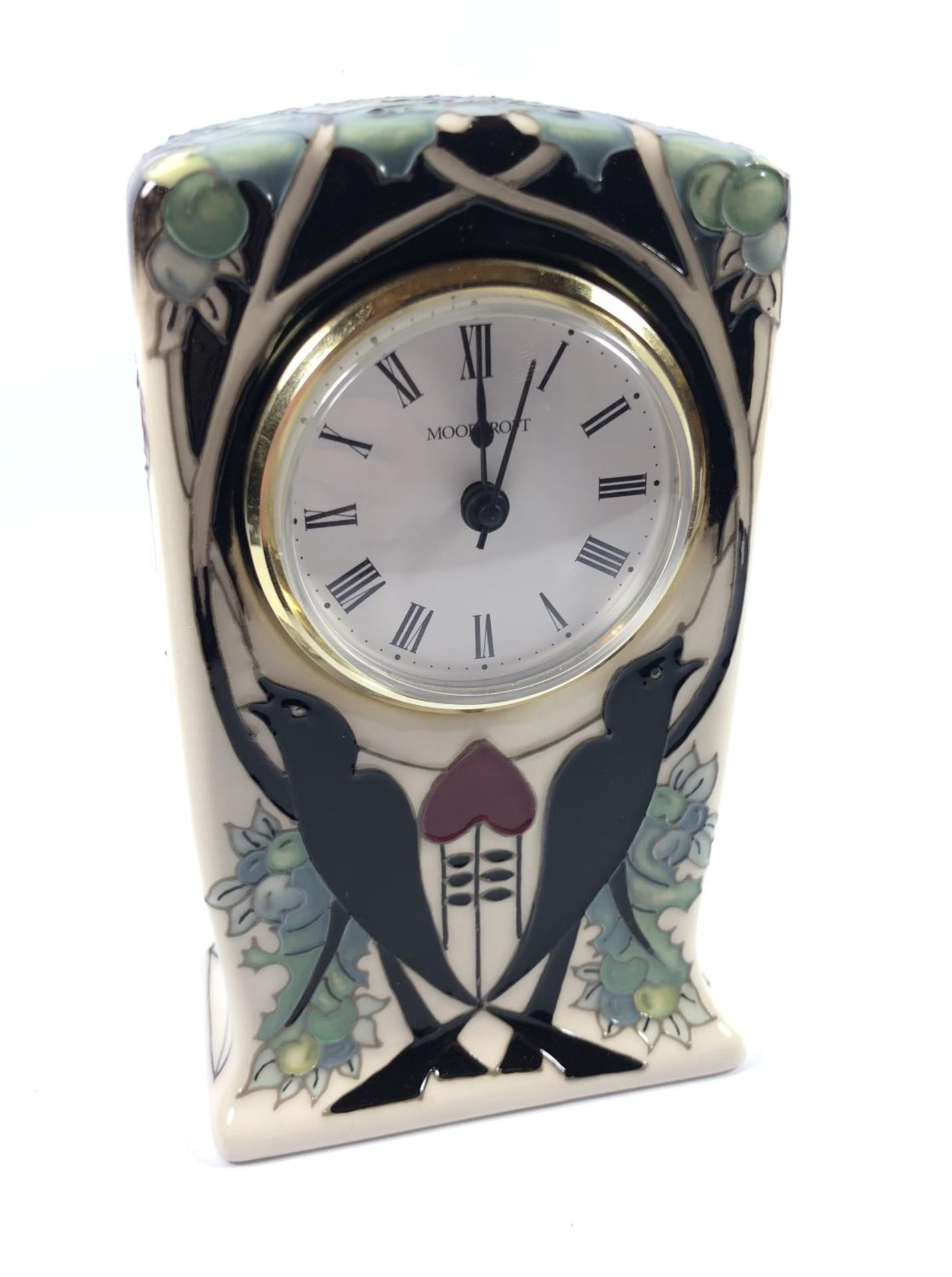 A MOORCROFT POTTERY 'TALWIN' PATTERN CLOCK, HEIGHT 15.5CM, UNDERGLAZE CHIP TO BASE