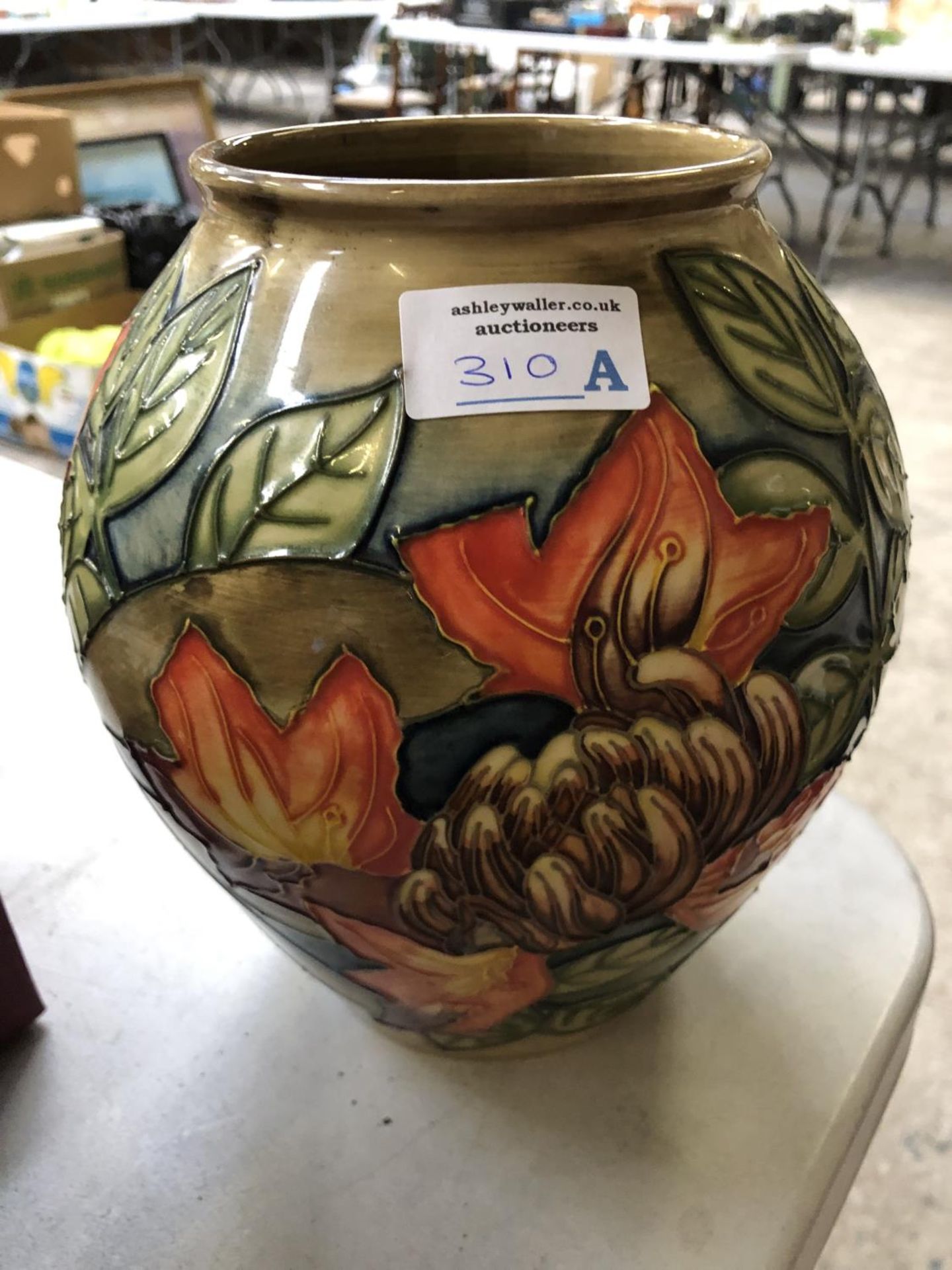 A MOORCROFT POTTERY 'FLAME OF THE FOREST' PATTERN VASE, DATED '97, HEIGHT 21CM