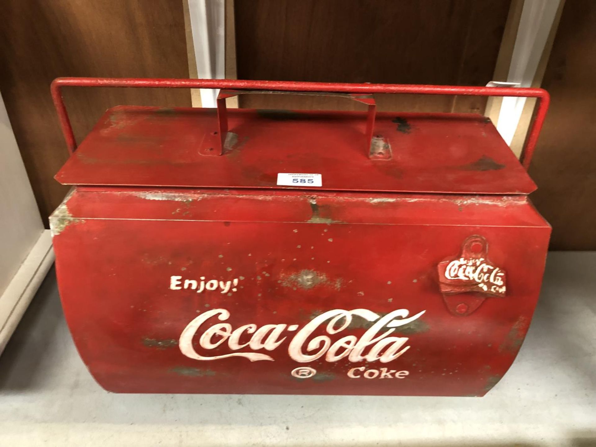 A RED METAL COCA COLA DRINKS COOLER