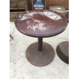 A CAST IRON PEDESTAL TABLE BASE WITH ROUND WOODEN TOP (NOT ATTACHED)