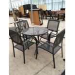 A GREY GLASS TOPPED GARDEN TABLE 88CM DIAMETER WITH FOUR MATCHING METAL CHAIRS