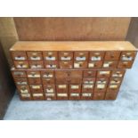 TWO VINTAGE SHOP CABINETS, ONE SIXTEEN DRAWERS (119.5CM X 21CM X 21CM HIGH) AND ONE TWENTY SIX