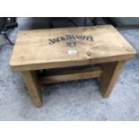 A WOODEN JACK DANIELS DESIGN STOOL