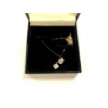 A LADIES 9CT YELLOW GOLD TWO STONE DROP PENDANT NECKLACE, BOXED