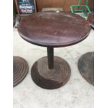 A CAST IRON PEDESTAL TABLE BASE WITH ROUND WOODEN TOP (NOT ATTACHED)