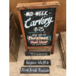 A WOODEN A FRAME BLACKBOARD AND THREE HANG UP SIGN BOARDS