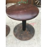 A CAST IRON PEDESTAL TABLE BASE WITH ROUND WOODEN TOP (NOT ATTACHED)