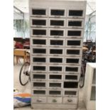 A VINTAGE SHOP CABINET WITH THIRTY THREE DRAWERS 91CM X 52.5CM X 198CM HIGH (ONE DRAWER MISSING)