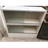 A VINTAGE METAL CABINET WITH TWO SHELVES AND GLASS SLIDING DOORS 89CM X 30CM X 89CM