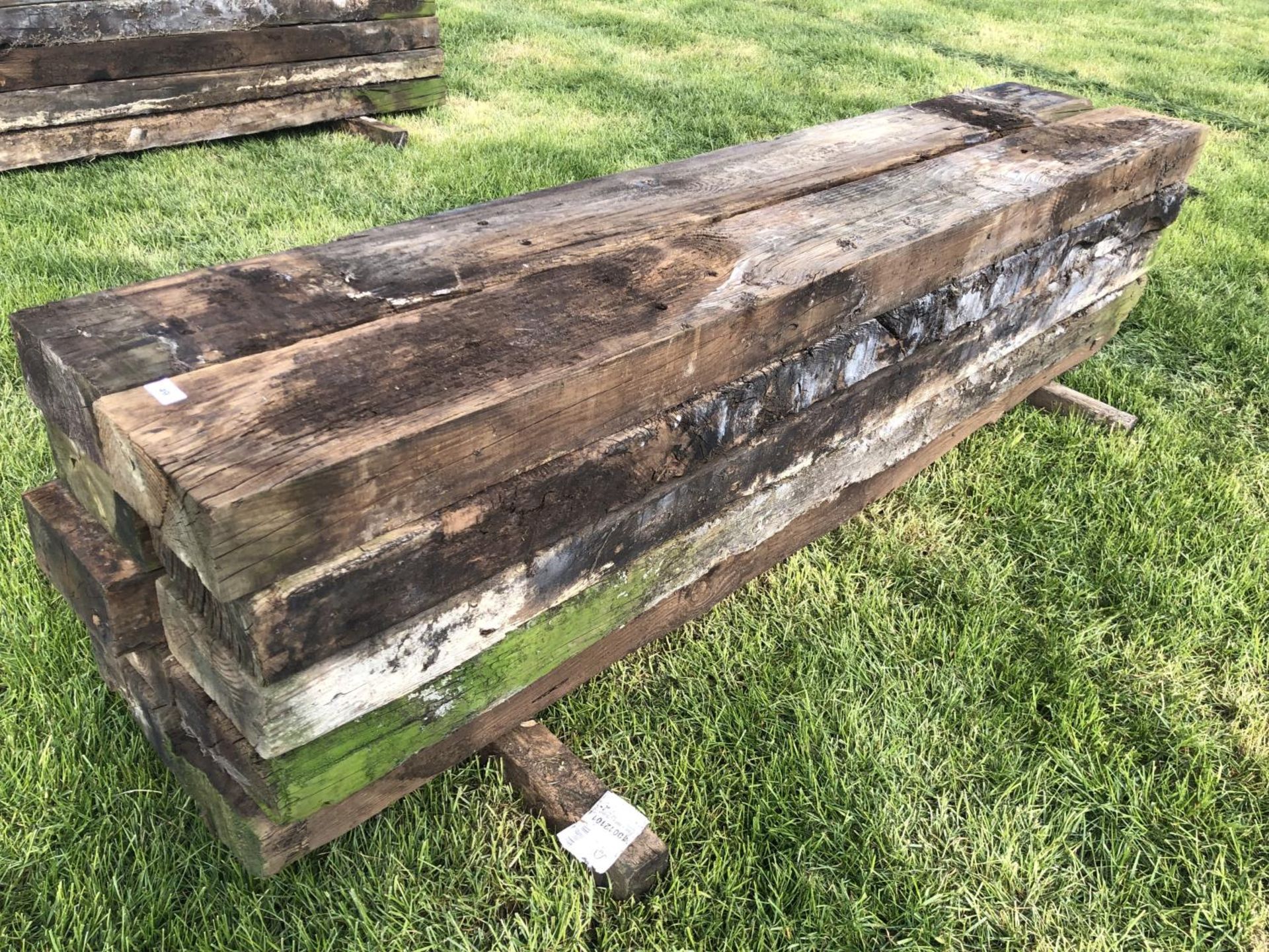 TEN WOODEN RAILWAY SLEEPERS