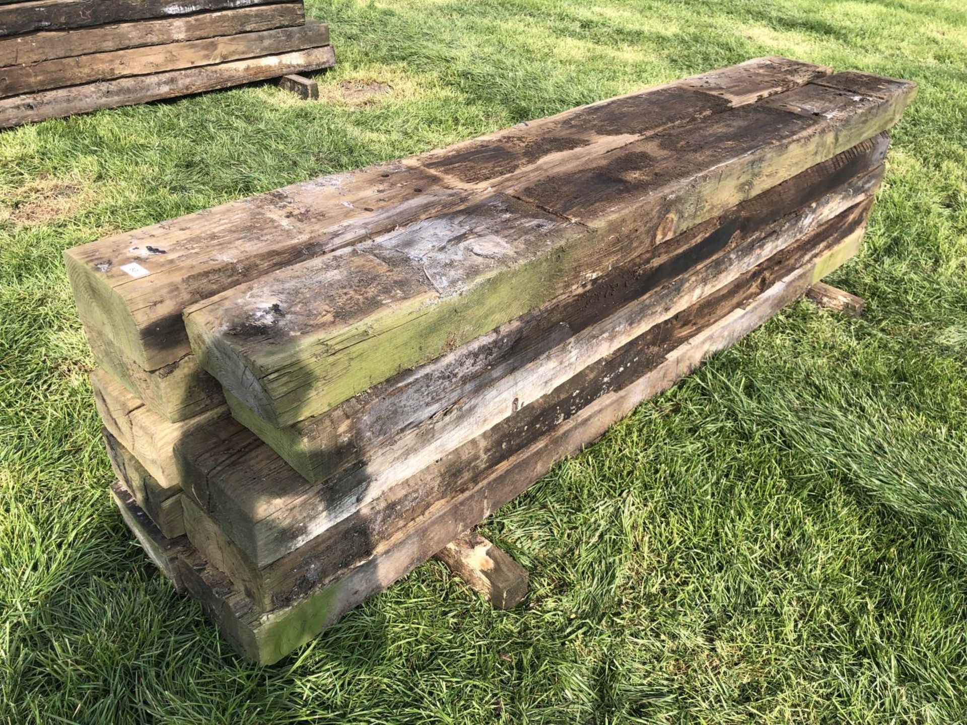 TEN WOODEN RAILWAY SLEEPERS