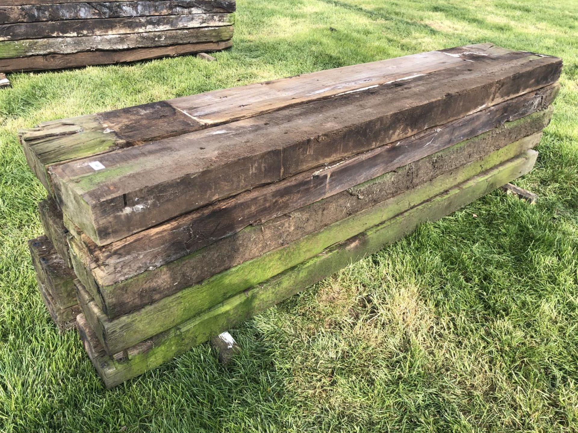 TEN WOODEN RAILWAY SLEEPERS