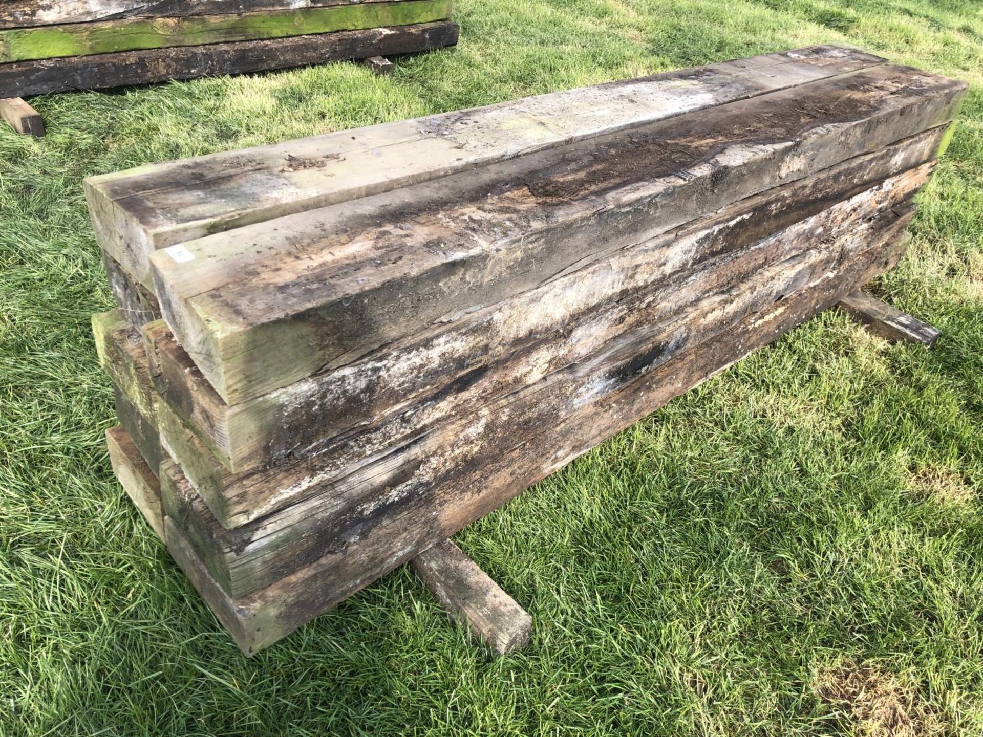 TEN WOODEN RAILWAY SLEEPERS