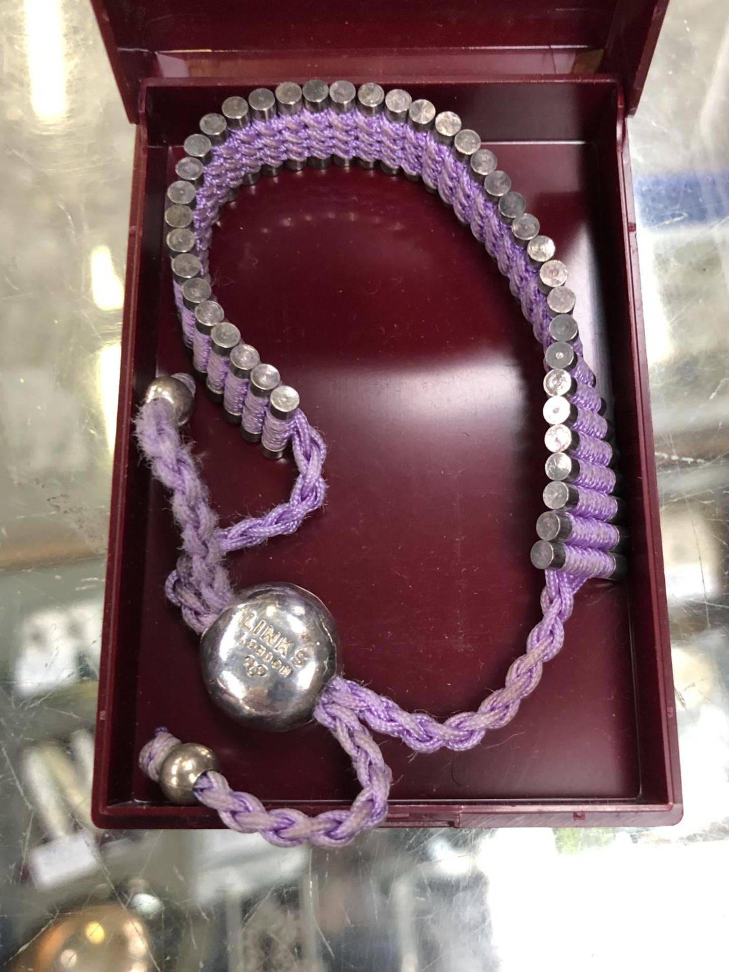 A LADIES BOXED BRACELET