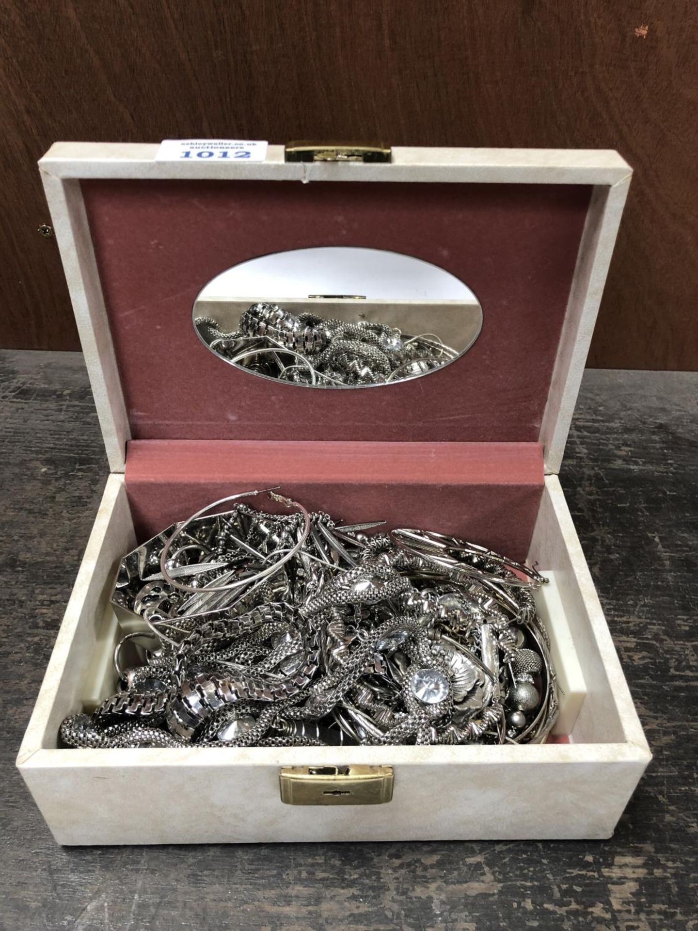 A BOX CONTAINING WHITE METAL JEWELLERY