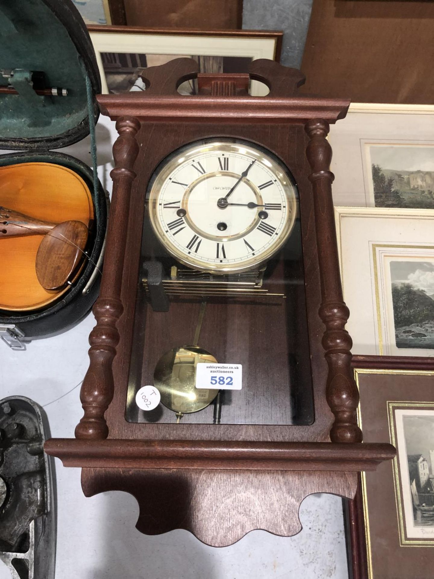 A MAHOGANY CASED WM WIDDOP WESTMINSTER CHIMING WALL CLOCK WITH BRASS FACE AND ENAMEL DIAL