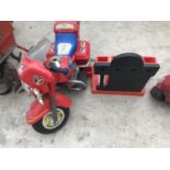 A BLACK AND DECKER CHILDS WORK BENCH WITH VICE AND A POLICE RIDE ON MOTORBIKE