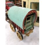 A VINTAGE WOODEN MODEL OF A ROMANY CARAVAN