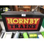 A HORNBY TRAINS ILLUMINATED SIGN IN METAL CASE