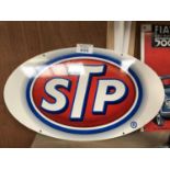 A VINTAGE STYLE METAL STP MOTOR OIL SIGN