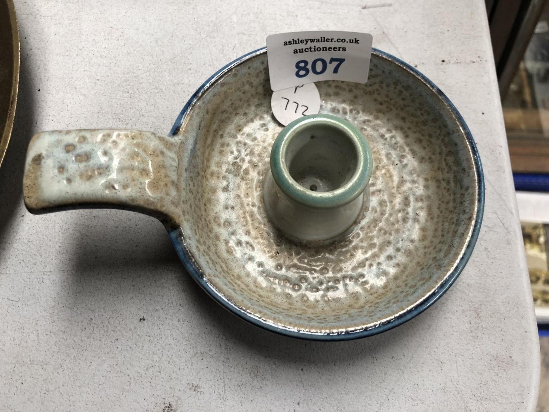 A ROYAL COPENHAGEN FAIENCE WARE CANDLE HOLDER