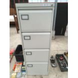 A FOUR DRAWER METAL FILING CABINET